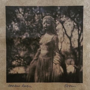 garden angel by Oliver Tollison